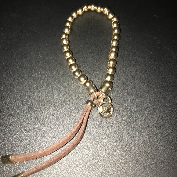 Michael Kors Jewelry - Michael Kors gold charm bracelet new